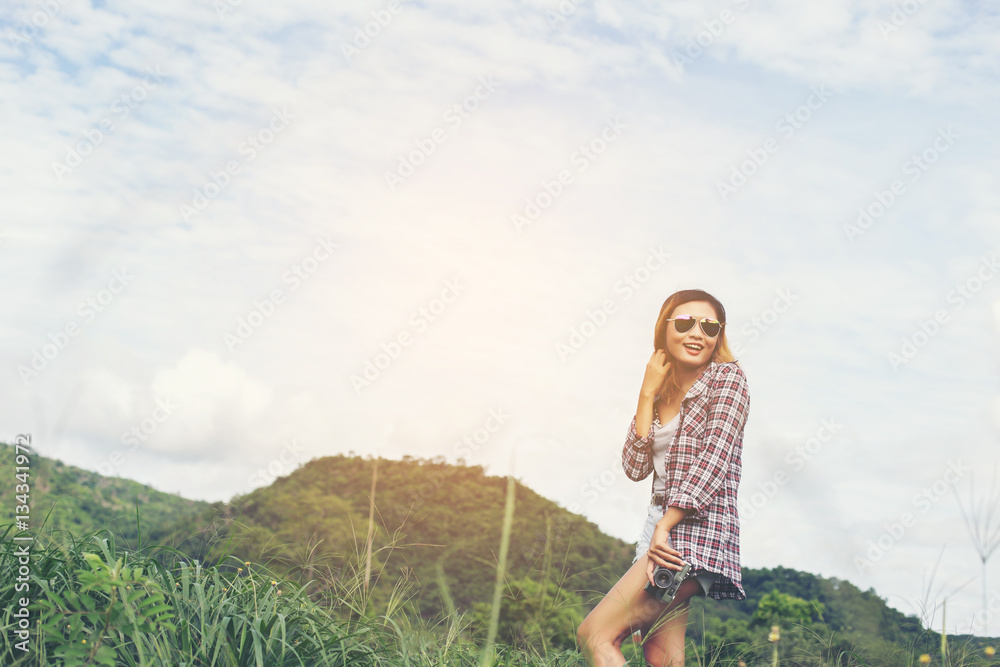 Young Hipster Woman with retro camera taking shot outdoor landsc Young Hipster Woman with retro camera taking shot outdoor landsc