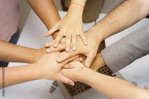 Team Work Concept : Group of Diverse Hands Together Cross Proces