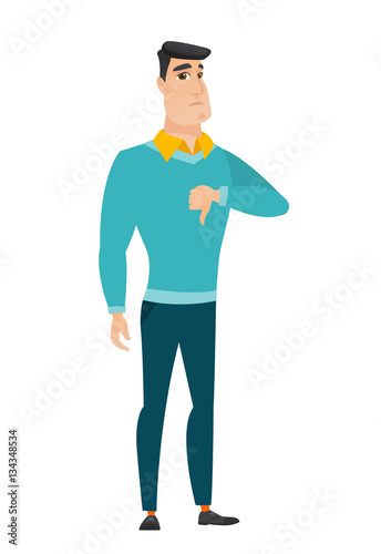 Disappointed caucasian businessman with thumb down