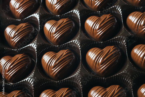 Box of heart-shaped chocolate candies for Valentine's day