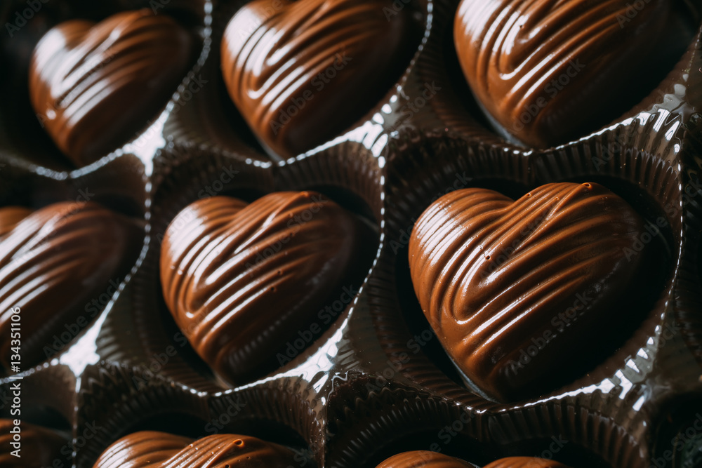 Closeup on box of heart-shaped chocolate