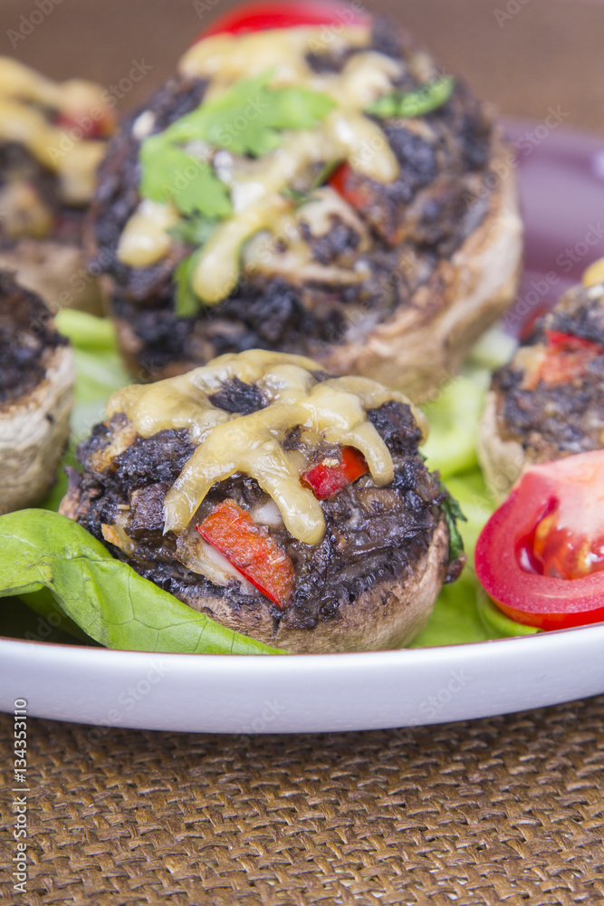 Stuffed champignons with eggs, cheese and paprika.