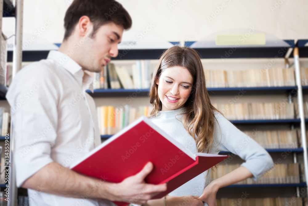 Students in a library Students in a library
