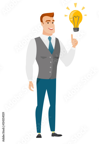 Businessman pointing at business idea light bulb.