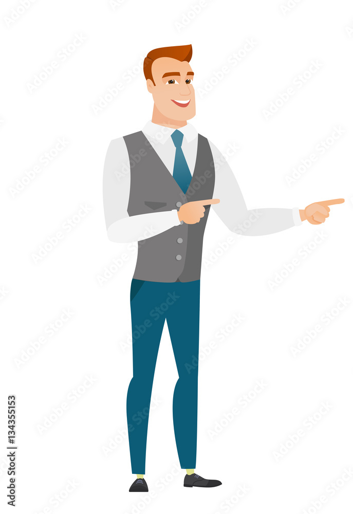 Young caucasian businessman pointing to the side. Young caucasian businessman pointing to the side.
