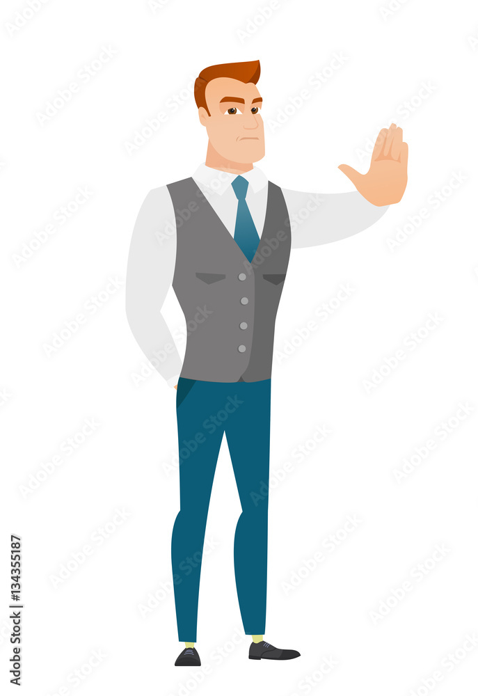 Caucasian businessman showing stop hand gesture.