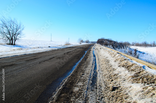 Asphalt road on winter