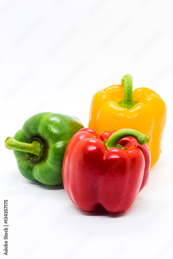 Multi color Bell peppers on white background Multi color Bell peppers on white background