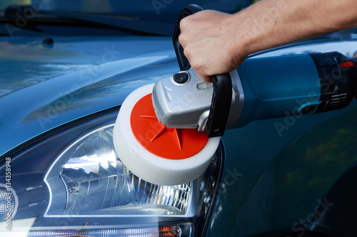 blue car is polishing photo