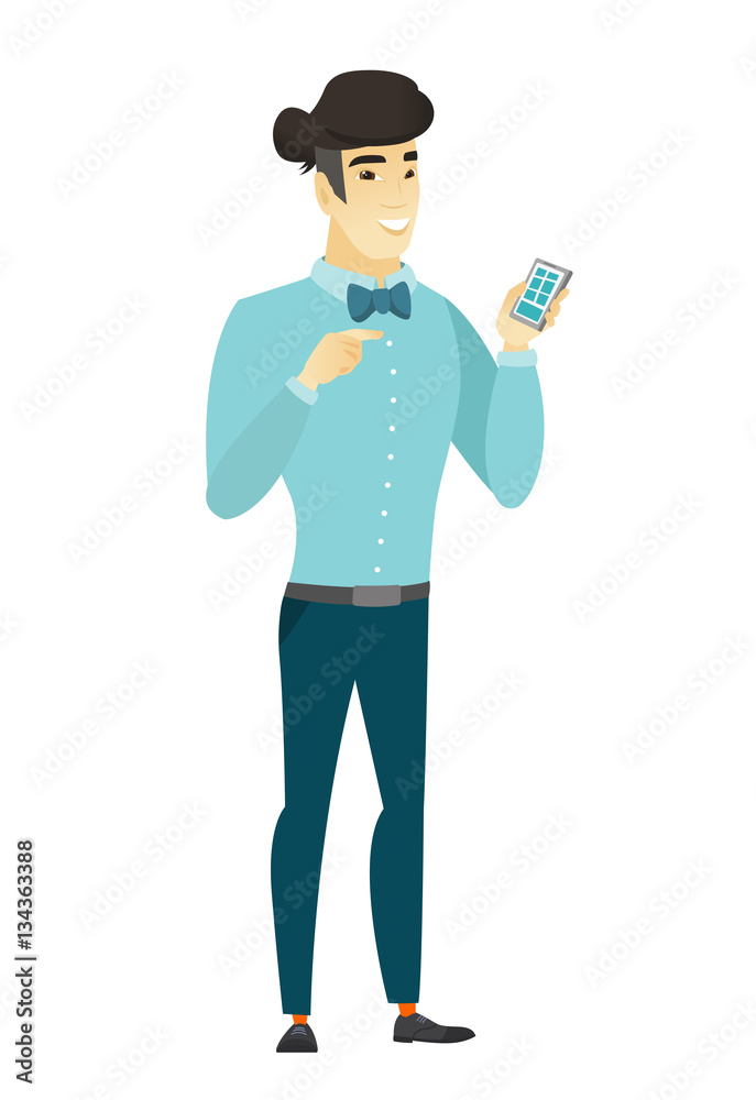 Asian business man holding a mobile phone.