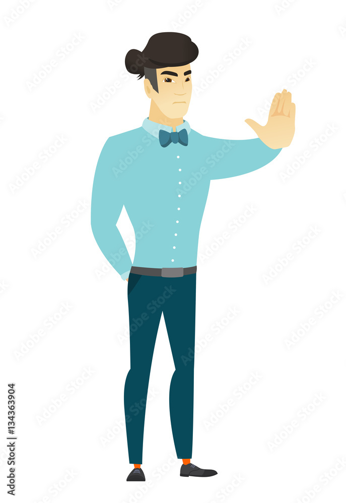Asian businessman showing stop hand gesture.