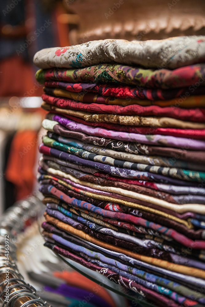 Moroccan women's bright colorful clothes at a market