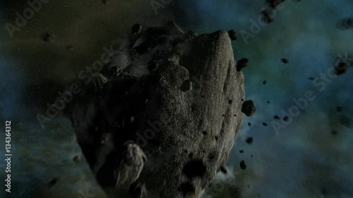 Asteroid traveling in space with camera crossing near it in 4k quality 3d animation
