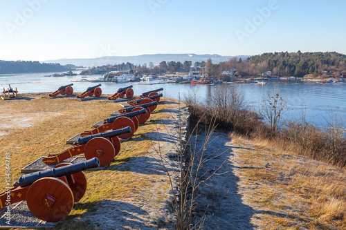 Old cannons of former fort on the Norwegian island near Oslo