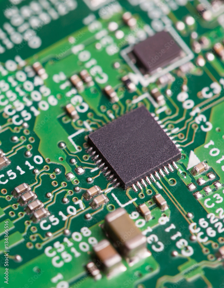 Close up of electronic components on the motherboard, microprocessor chip Close up of electronic components on the motherboard, microprocessor chip