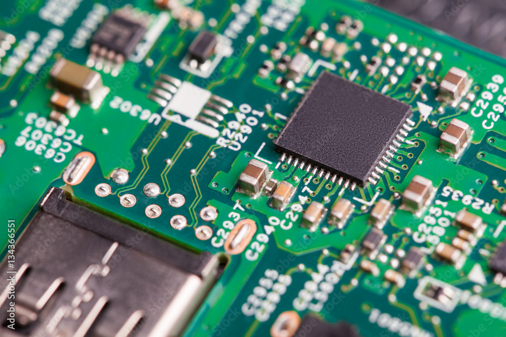 Close up of electronic components on the motherboard, microprocessor chip Close up of electronic components on the motherboard, microprocessor chip