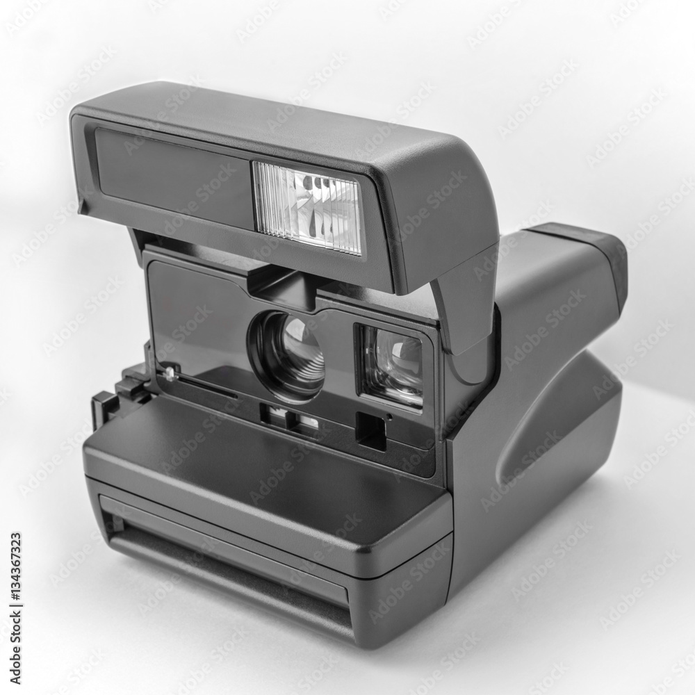 Close Up Instant Camera. Instant camera isolated on white background. Close Up Instant Camera. Instant camera isolated on white background.