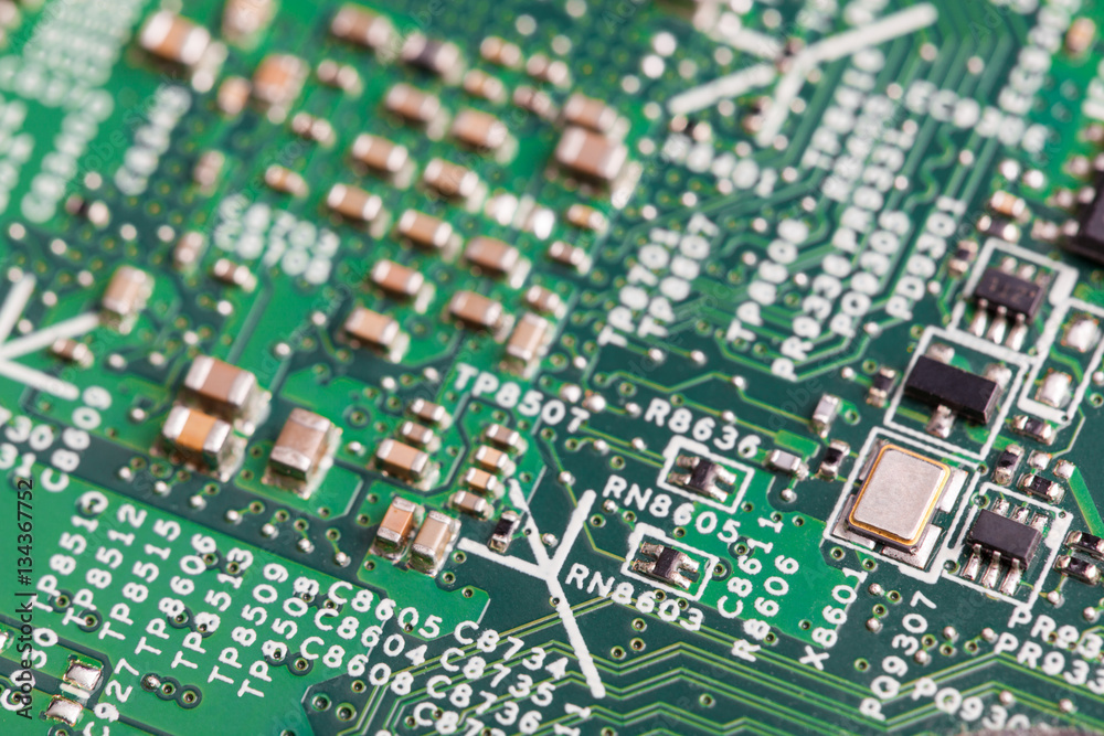 Close up of electronic components on the motherboard, microprocessor chip Close up of electronic components on the motherboard, microprocessor chip