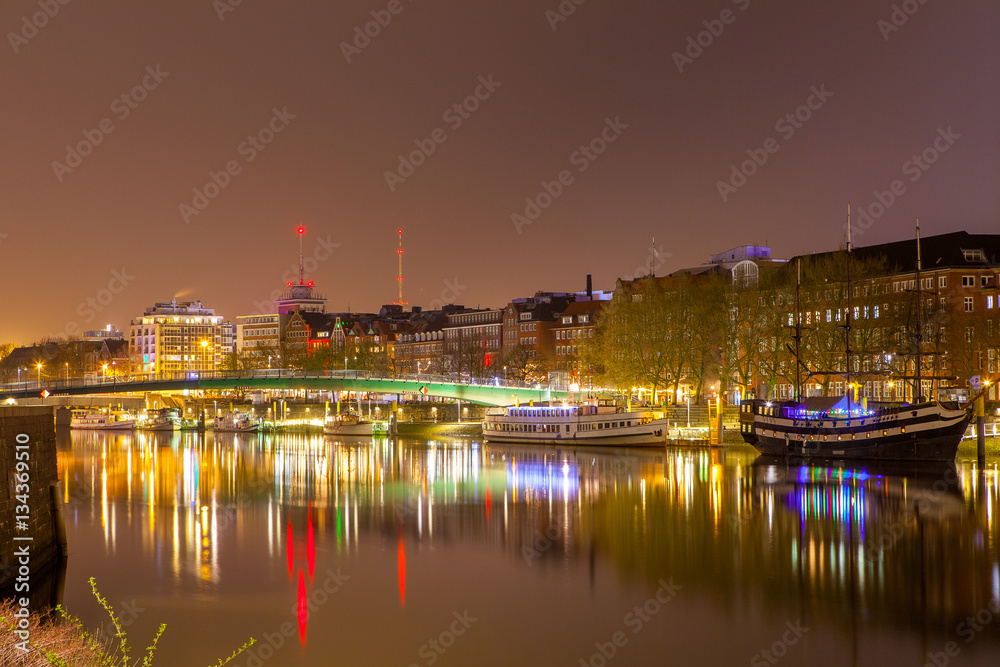 Cityscape of night Bremen, Germany over the Rhein river