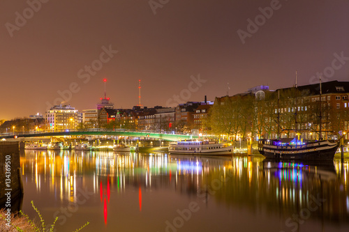 Cityscape of night Bremen  Germany over the Rhein river