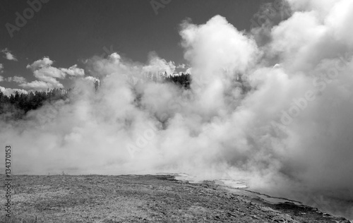 Excelsior Geyser in the Midway Geyser Basin next to the Firehole River in Yellowstone National Park in Wyoming USA - black and white