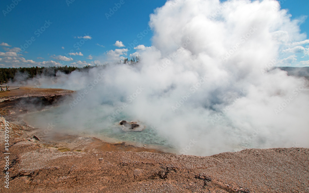 Excelsior Geyser in the Midway Geyser Basin next to the Firehole River in Yellowstone National Park in Wyoming U S A