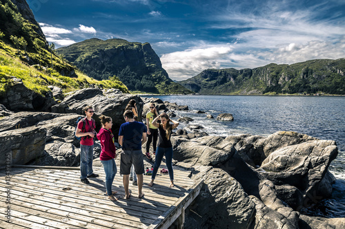 Group of young people are enjoying the sunny day in Norway