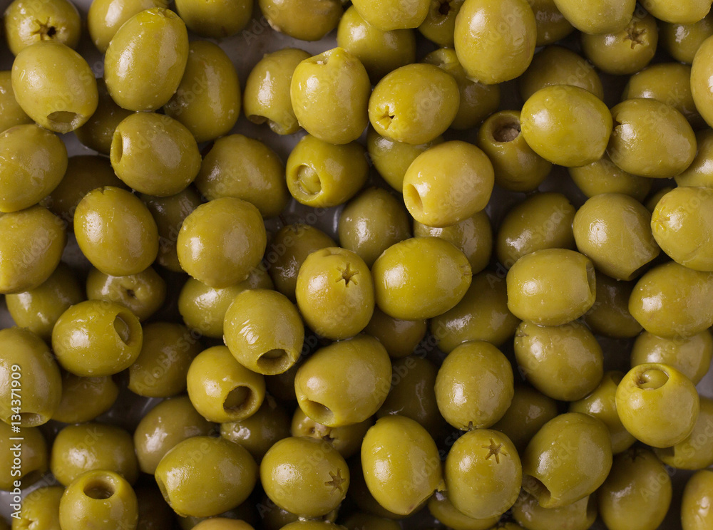 Background of olives. Background with green olives. Olives. Olive Background of olives. Background with green olives. Olives. Olive