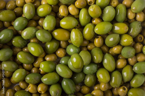 Background of olives. Background with green olives. Olives.  Olive