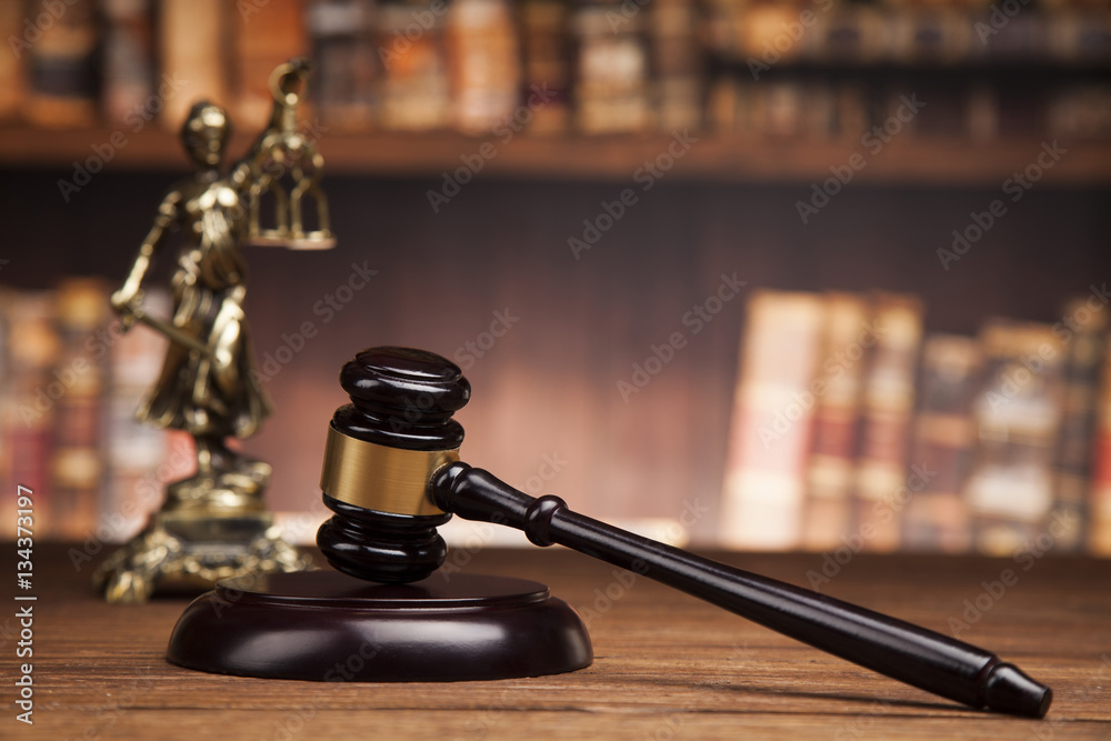 Law and justice concept, Brown wooden background
