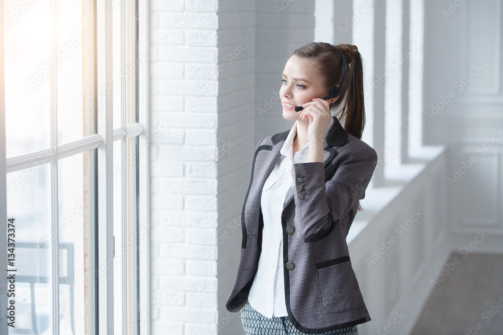 Portrait of young smiling female customer support Portrait of young smiling female customer support