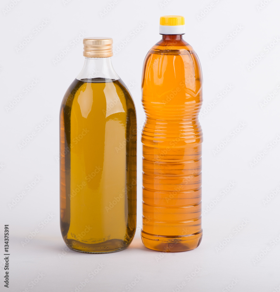 Bottles of oil on the white background Bottles of oil on the white background