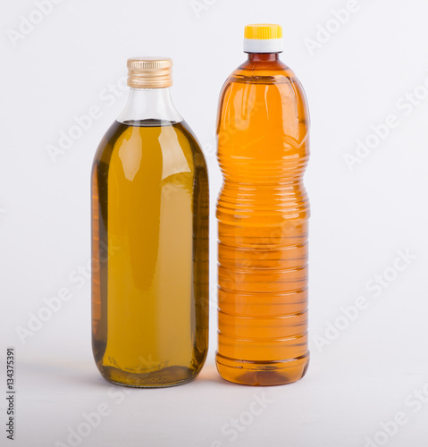 Bottles of oil on the white background