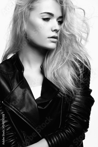 beautiful blonde girl in leather coat