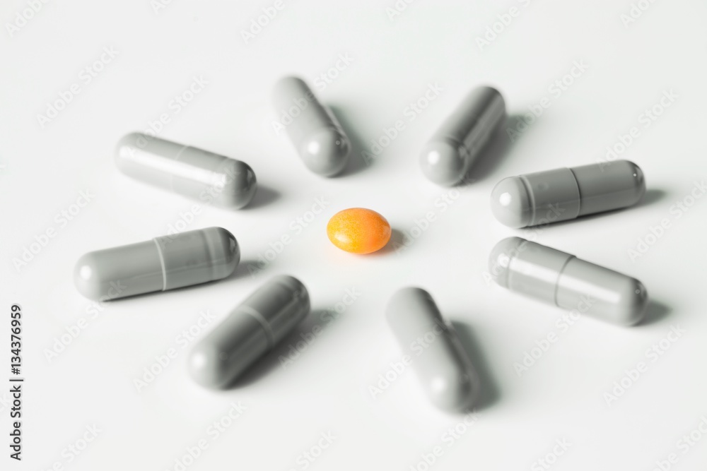 medical pills and capsules pattern on white background. flat lay, top view. medical pills and capsules pattern on white background. flat lay, top view.