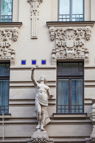 An element of facade of an Art Nouveau building with bas-relief and statues. Riga, Latvia.
