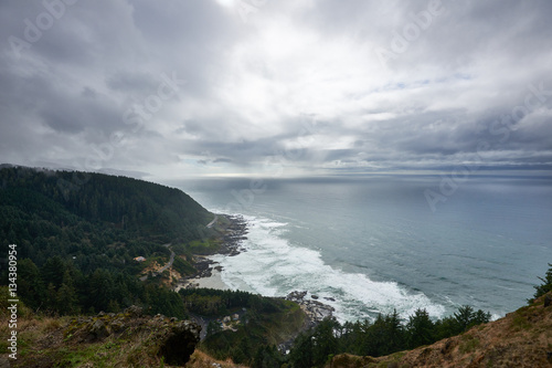 Ocean and coastline view from Cape Perpetua overlook in cloudy rainy day. Oregon  USA.