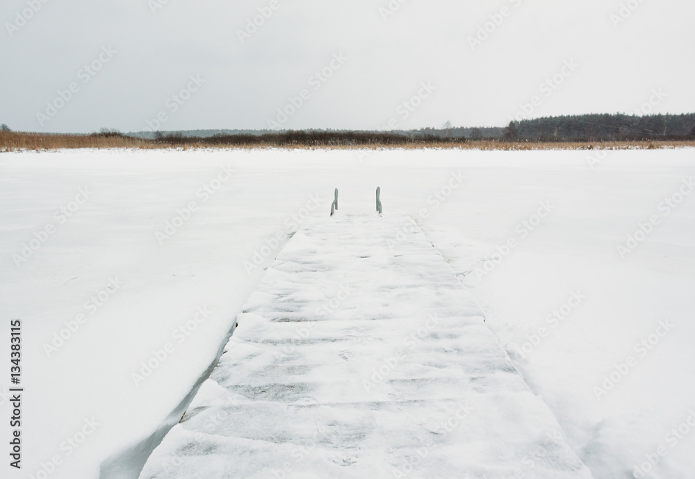 Pier on the river in winter Pier on the river in winter