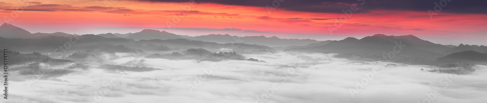 Obraz premium Foggy sunrise in the Carpathian mountains