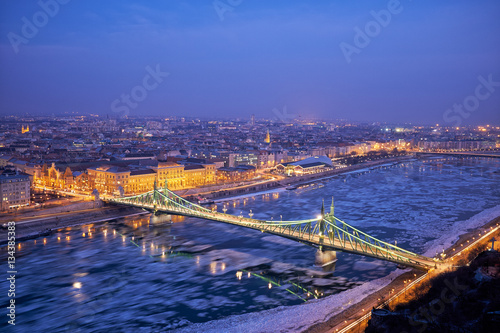 Liberty bridge danube river winter in Budapest night