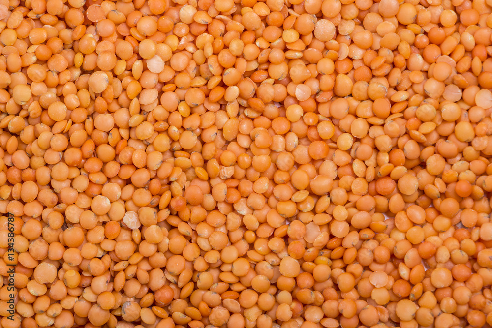 Picture of brown lentils over flat surface for background