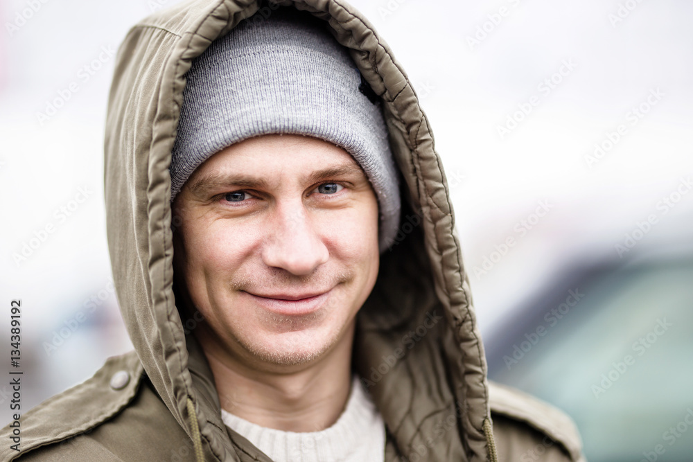 Close up of smile man wearing winter jacket