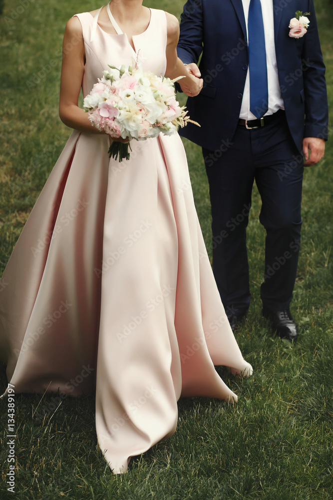 bride and groom hugging walking, holding hands, luxury wedding c bride and groom hugging walking, holding hands, luxury wedding c