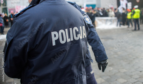 detail of a police  Policja  officer in Poland  demonstration in