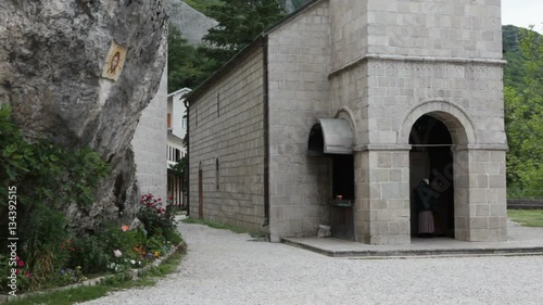Entrance in building of the Church of the Holy Trinity. The center of courtyard of lower monastery of Ostrog. The monastic residences. Montenegro
