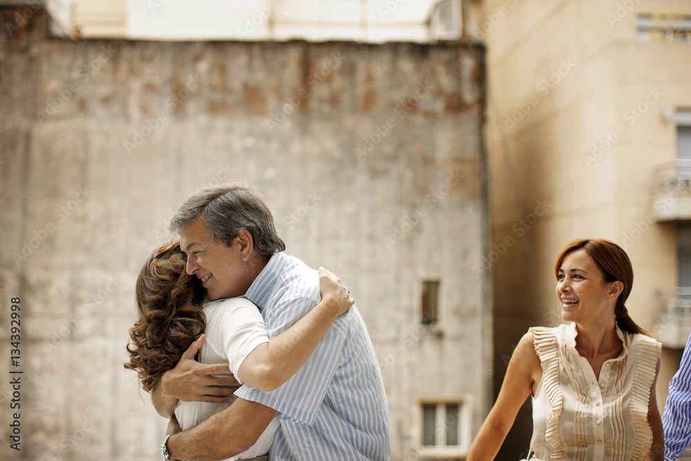 Middle age couple embrace. Middle age couple embrace.