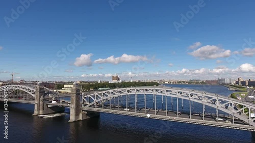 Panoramic aerial view from the drone at the Bolsheokhtinsky bridge across Neva river, the Malaya Okhta district, St. Petersburg, Russia
 photo