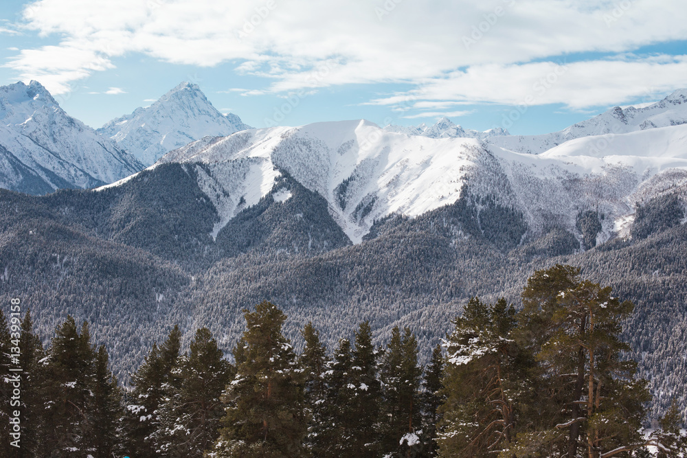 Winter mountains panorama with ski slopes. Caucasus.