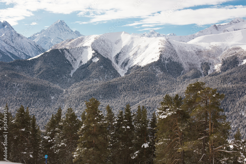 Winter mountains panorama with ski slopes. Caucasus.