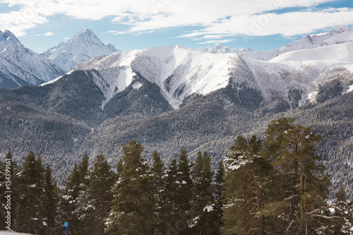 Winter mountains panorama with ski slopes. Caucasus. © explorich